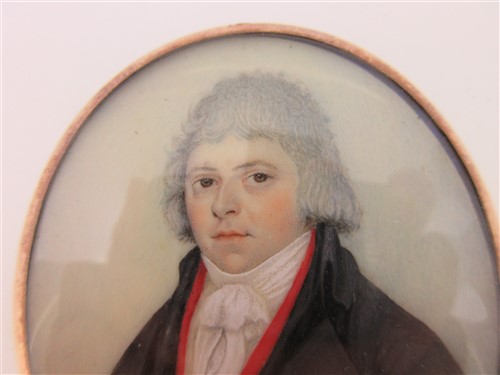 Lot 125 - A portrait miniature attributed to Adam Buck with hairwork and enamel back