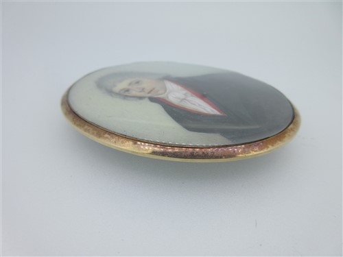 Lot 125 - A portrait miniature attributed to Adam Buck with hairwork and enamel back