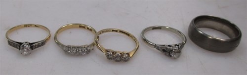 Lot 356 - Four diamond set rings together with a...