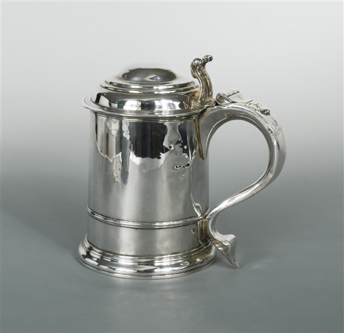 Lot 554 - A George I Britannia silver lidded tankard