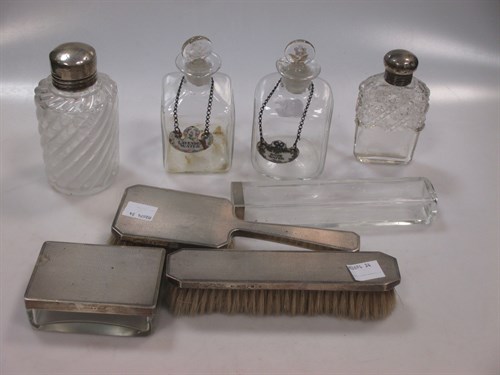 Lot 390 - Two dressing table jars with silver tops,...