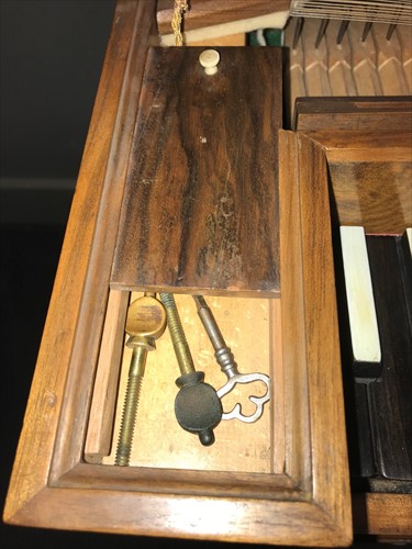 Lot 572 - A walnut cased 4 octave Clavichord by Henry Tull, dated 1932