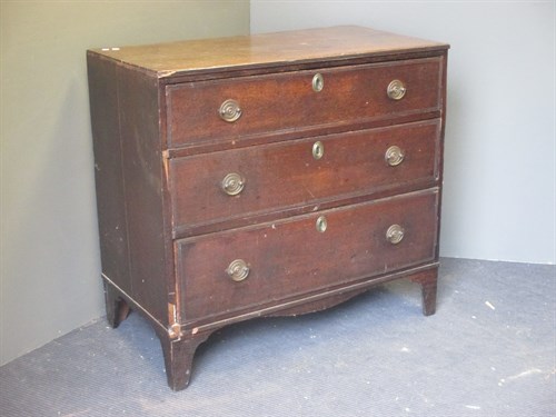 Lot 554 - A 19th century oak chest of three drawers and...