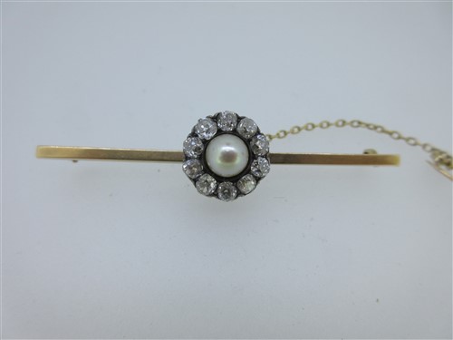 Lot 241 - A diamond and pearl cluster bar brooch
