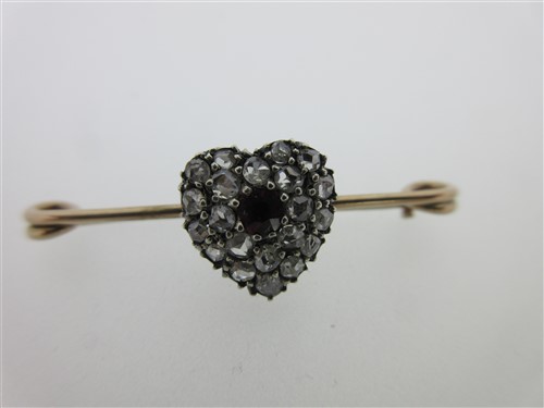 Lot 93 - A Victorian diamond and ruby navette ring and a diamond and ruby heart brooch