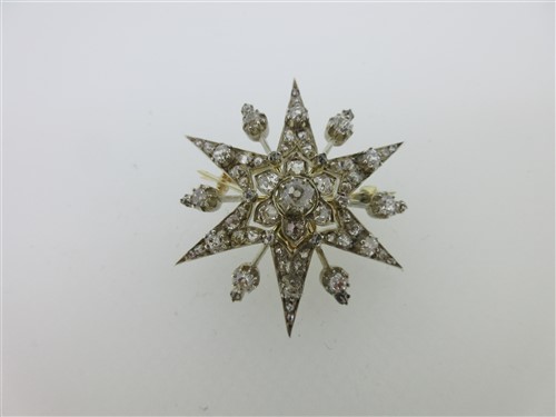 Lot 262 - A Victorian diamond star brooch / pendant