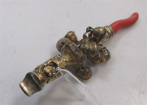 Lot 428 - A gilt metal rattle with coral teething bar...