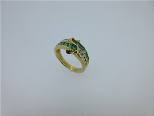 Lot 268 - An emerald, diamond and sapphire ring set in 18ct gold