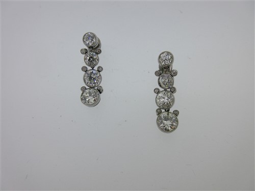 Lot 303 - A pair of early 20th century diamond waterfall earpendants