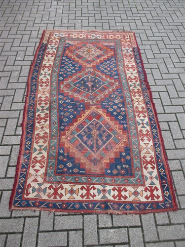 Lot 686 - A 20th Century Caucasian kilim 280 x 135cm