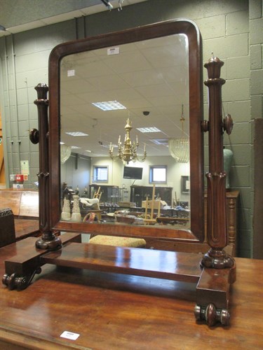 Lot 624 - A William IV mahogany swing mirror