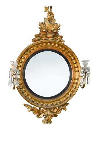 Lot 509 - A Regency gilt framed convex wall mirror