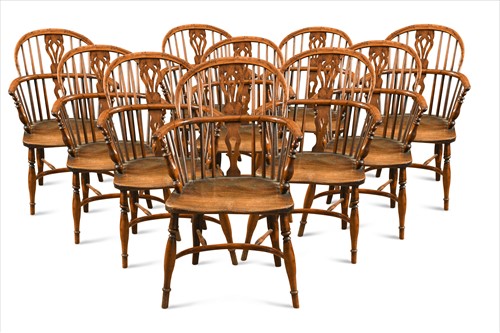 Lot 630 - A harlequin set of ten late 18th century yew wood windsor chairs
