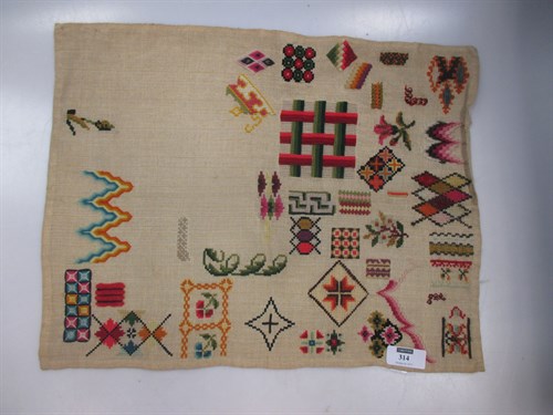 Lot 314 - Five 19th century needlework example panels, a...