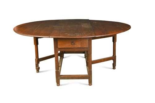 Lot 423 - A large 18th century oak gateleg table