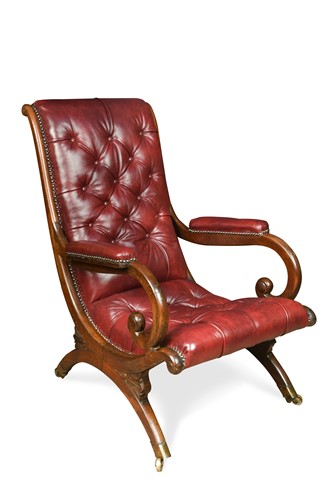 Lot 485 - A Regency mahogany x-framed library armchair