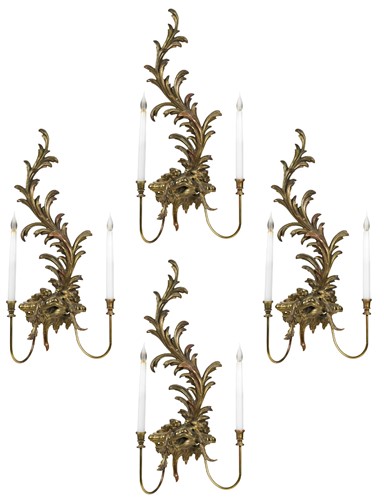 Lot 318 - A set of four modern two branch wall lights