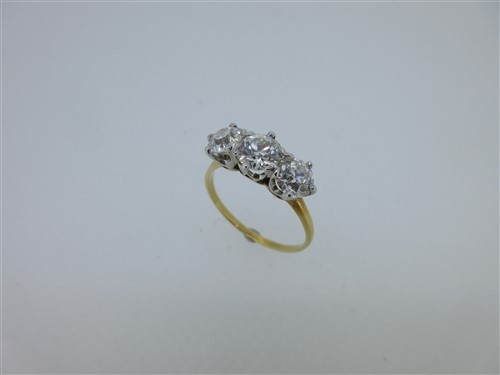 Lot 300 - A three stone diamond ring