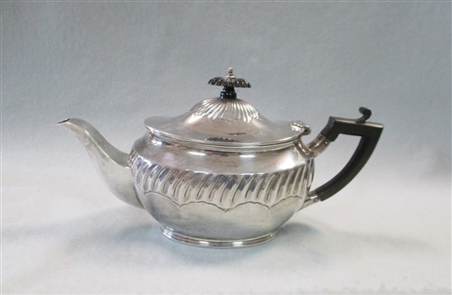 Lot 630 - A Victorian silver bachelor's teapot