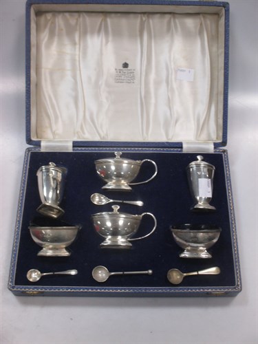 Lot 421 - A cased six piece silver condiment set by...