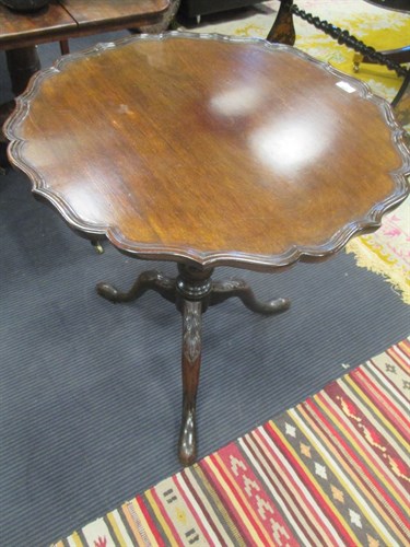 Lot 584 - A 1920's pie crust mahogany tripod table