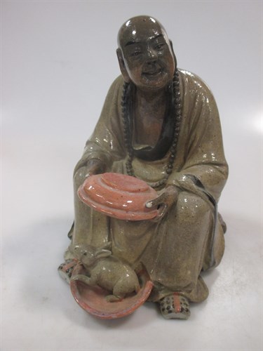 Lot 13 - An early 20th century Chinese stoneware figure...