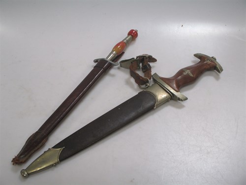 Lot 320 - A German WWII SA dagger together with another...