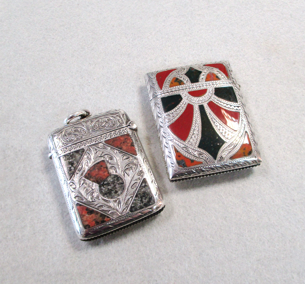 Lot 339 - Two silver vesta cases set with hardstones