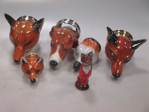 Lot 271 - A Royal Stratford porcelain fox head stirrup...