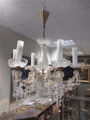 Lot 483 - A six branch glass chandelier
