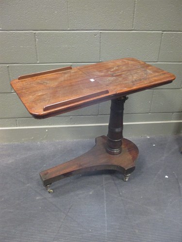 Lot 586 - A mahogany double sided reading table