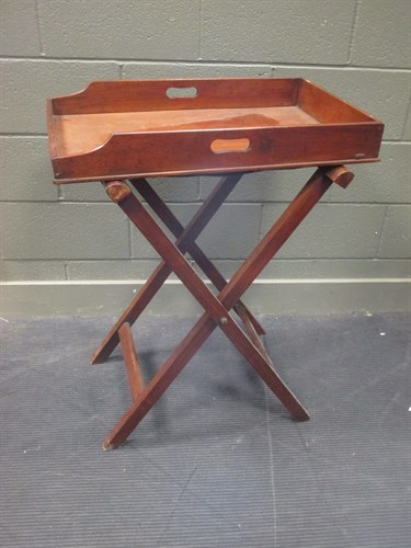 Lot 578 - A mahogany butlers tray with folding stand