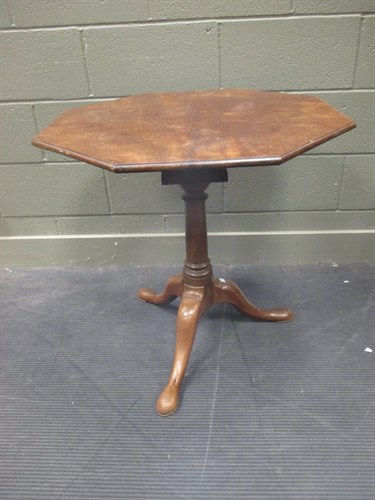 Lot 521 - A Georgian mahogany octagonal tripod table...