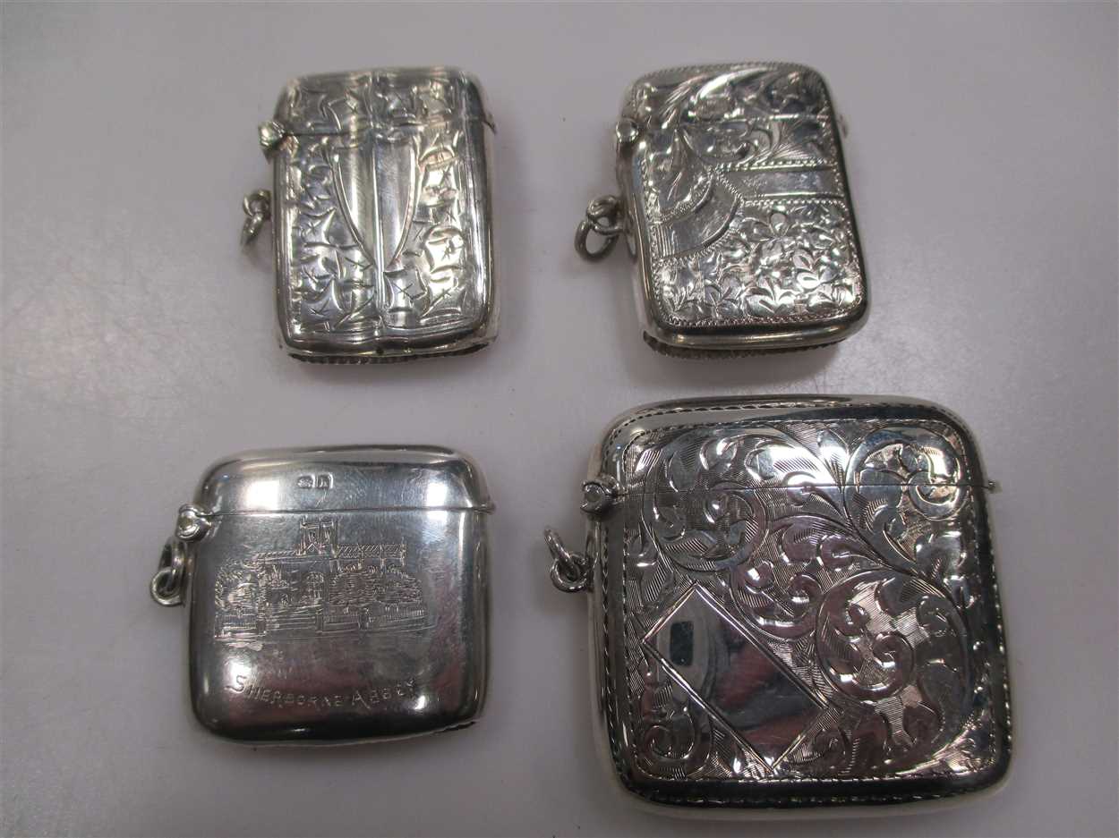 Lot 218 - Four silver vesta cases, including one...