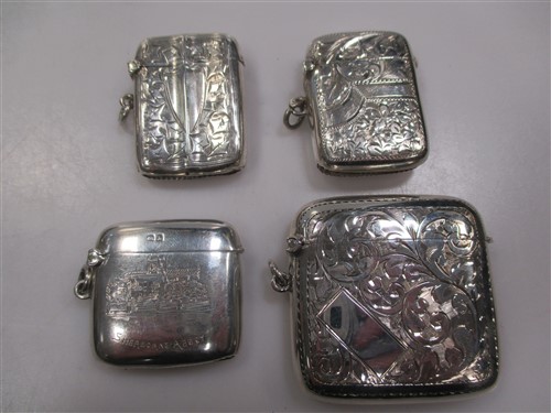 Lot 218 - Four silver vesta cases, including one...