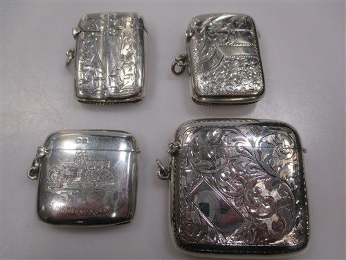 Lot 218 - Four silver vesta cases, including one...