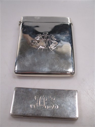 Lot 217 - A plain silver card case with hinged cover,...