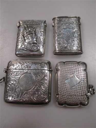 Lot 220 - Four silver vesta cases including one with...