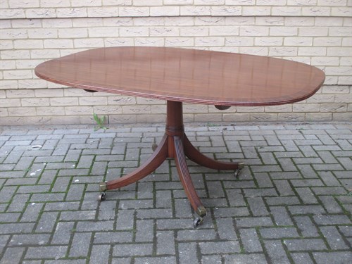 Lot 422 - A George III mahogany breakfast table Circa 1790
