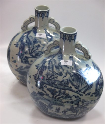 Lot 295 - A pair of Oriental blue and white moon flasks (2)