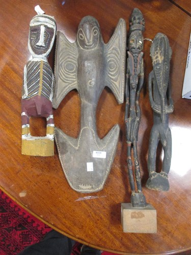 Lot 328 - Seven various carved wood tribal figures