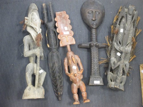 Lot 335 - Five various wooden tribal figures