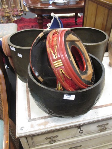 Lot 336 - A Chinese bowl gong with beater on a red...