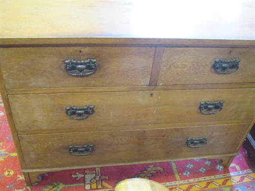 Lot 542 - An Art Nouveau ash chest of drawers 122cm wide