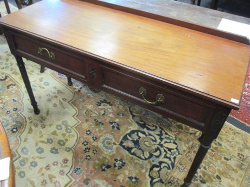 Lot 562 - An Edwardian mahogany side table, 72cm high,...