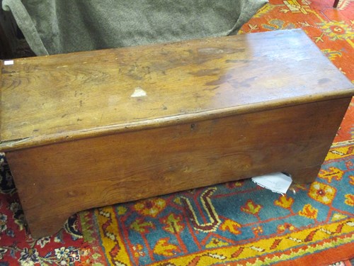Lot 553 - An 18th century elm plank chest, 98cm wide