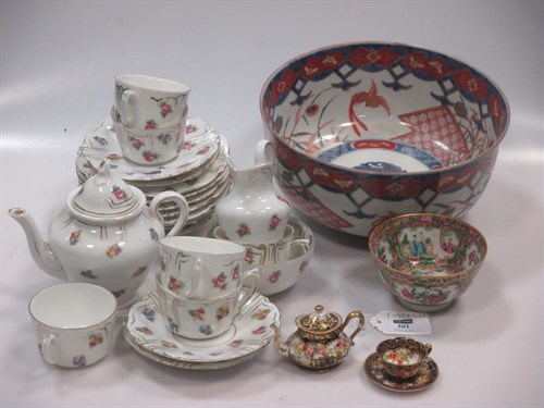 Lot 302 - Miniature imari colour teapot, cup and saucer,...