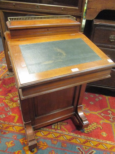 Lot 555 - A late Victorian walnut Davenport desk