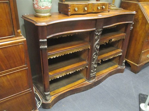 Lot 595 - A 19th century mahogany serpentine bookcase 93...