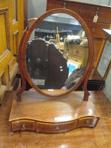 Lot 615 - An early 19th century mahogany dressing table...